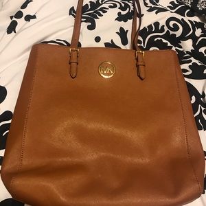 Like new condition MK it’s just too big for me